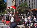Fantasy floats ` Skateboarding ground in the steel cage ` perform in the 2018 Credit Union Christmas Pageant parade.
